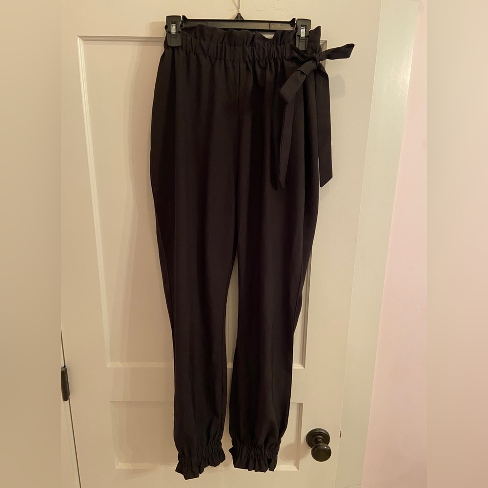 Black suit pants with bow tie/ wrap around waist and cinched ankles
